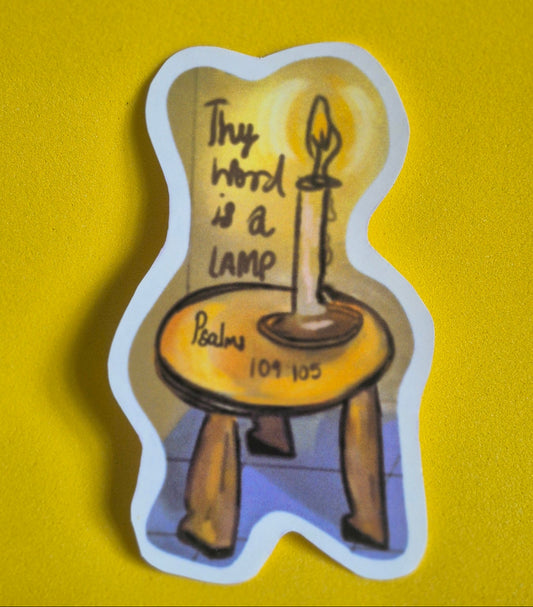 Sticker of a stool with a candle and text on a yellow background