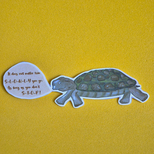 Sticker of a turtle with a speech bubble on a yellow background
